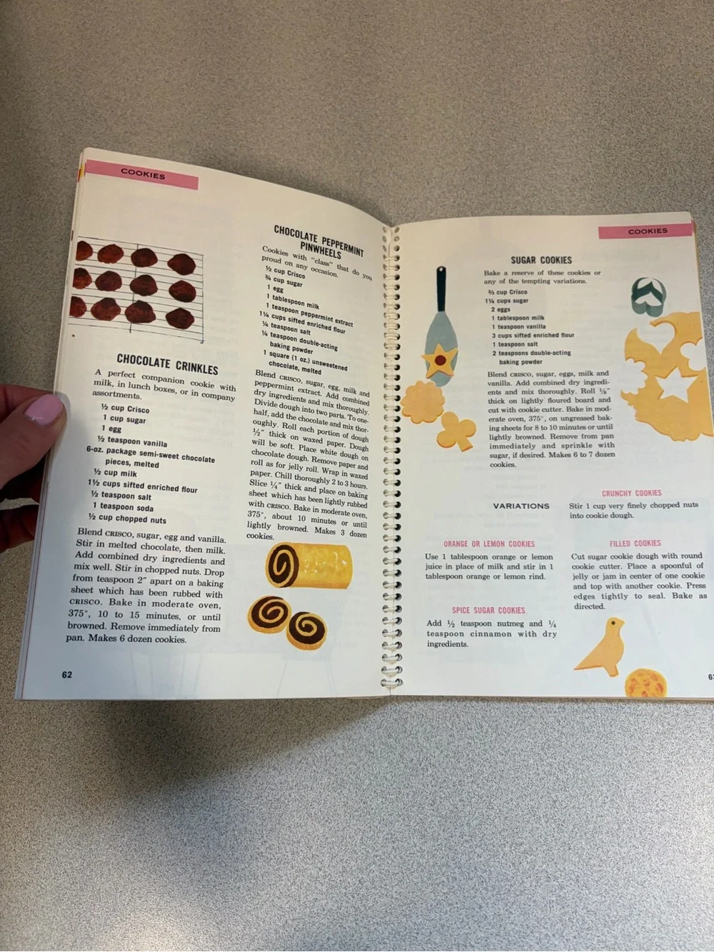 Cisco Cookbook with Bright Blue Cover and Red Polka-Dot Dress Illustration